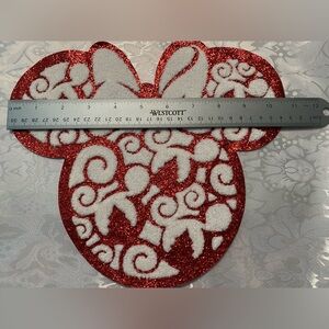 Glitter thread and chenille Minnie head iron on appliqué.
